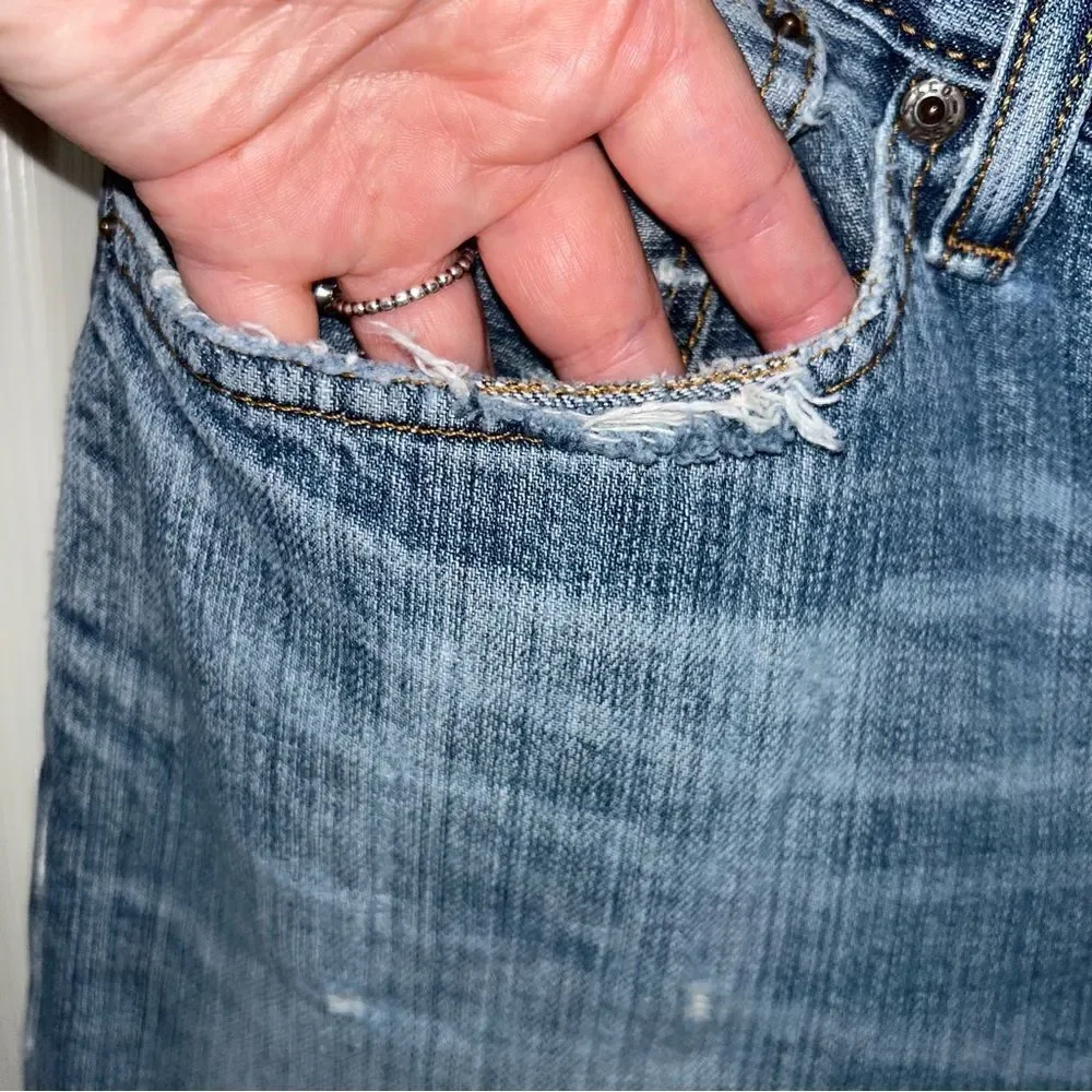 Levi’s 505 Distressed Denim Jeans
